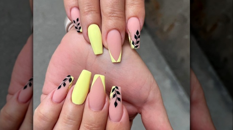 Yellow and black nail art