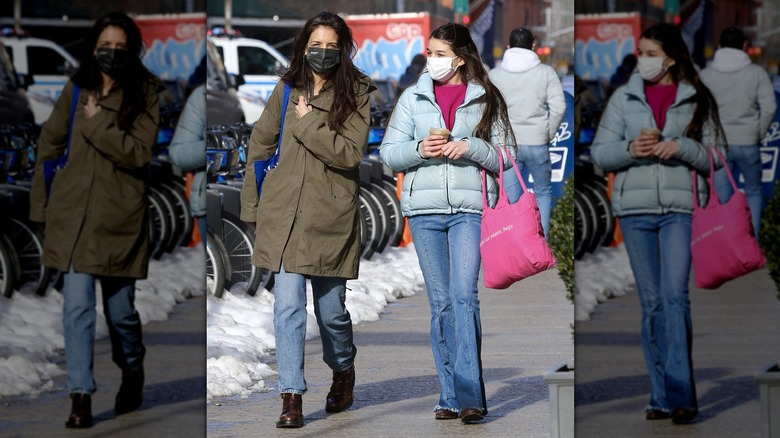 Katie Holmes and Suri Cruise walking