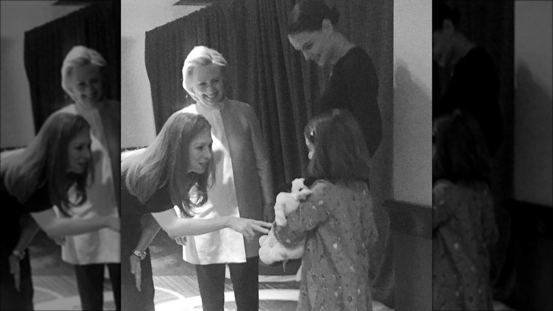 Chelsea and Hillary Clinton meeting Suri and Katie