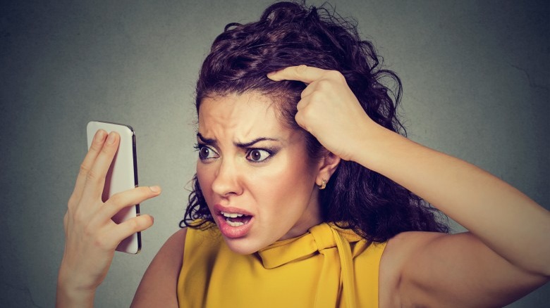 woman hair falling out stress