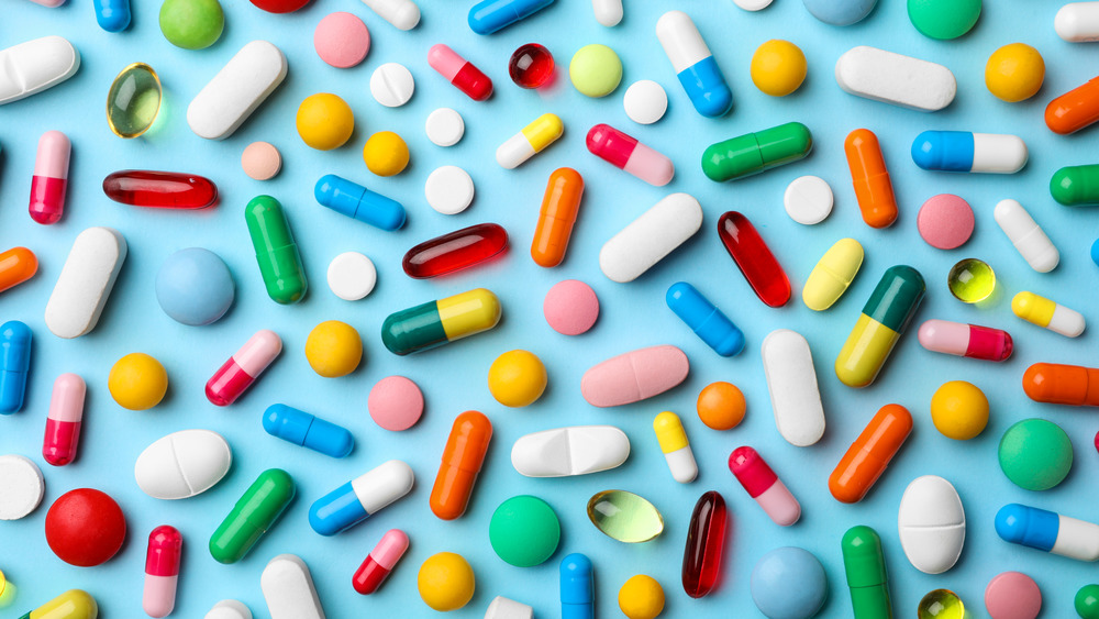 Pills on blue background