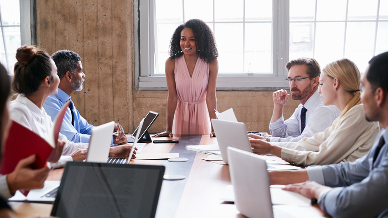 woman leading meeting