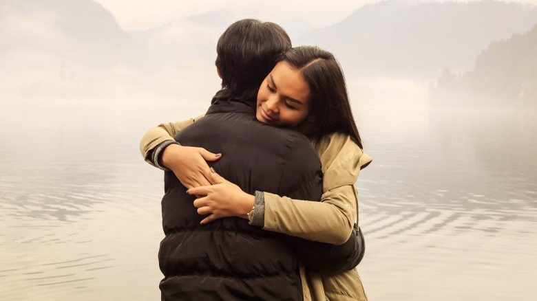 woman hugging man