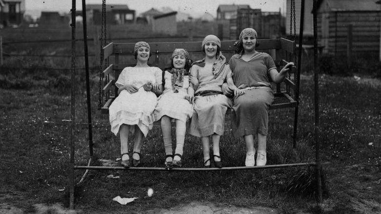 Four young women on swing 1924