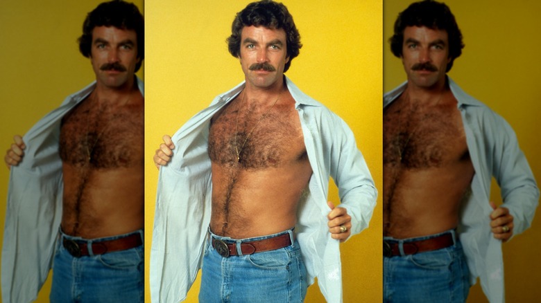 Tom Selleck showing chest hair and gold chain