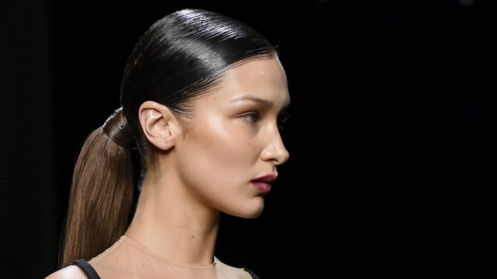 Bella Hadid up-close, in profile