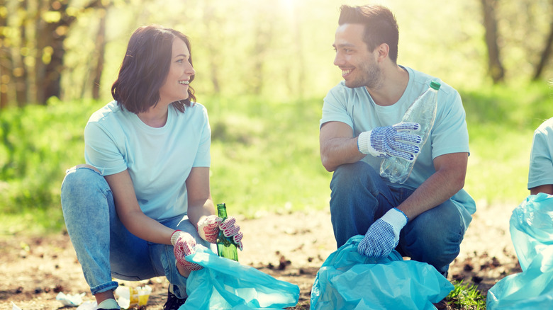 man and woman volunteering