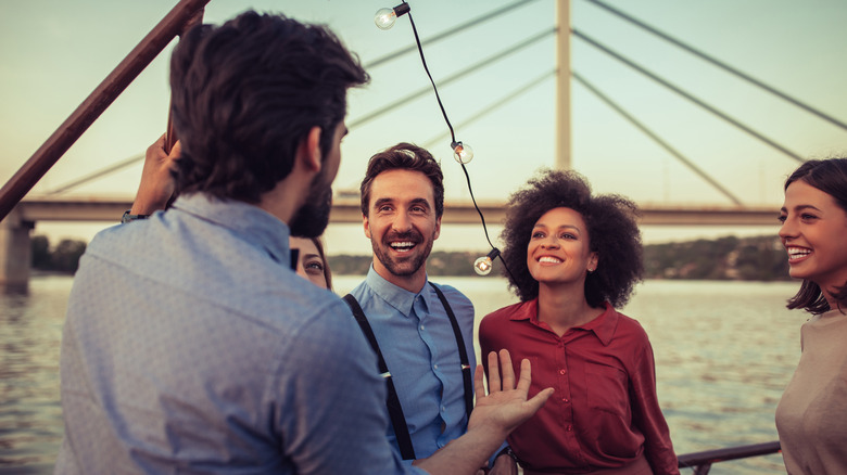 man telling story to friends