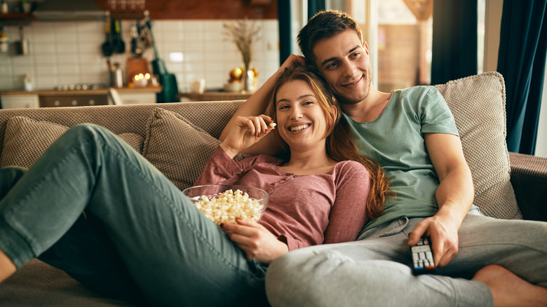 couple relaxing on the couch