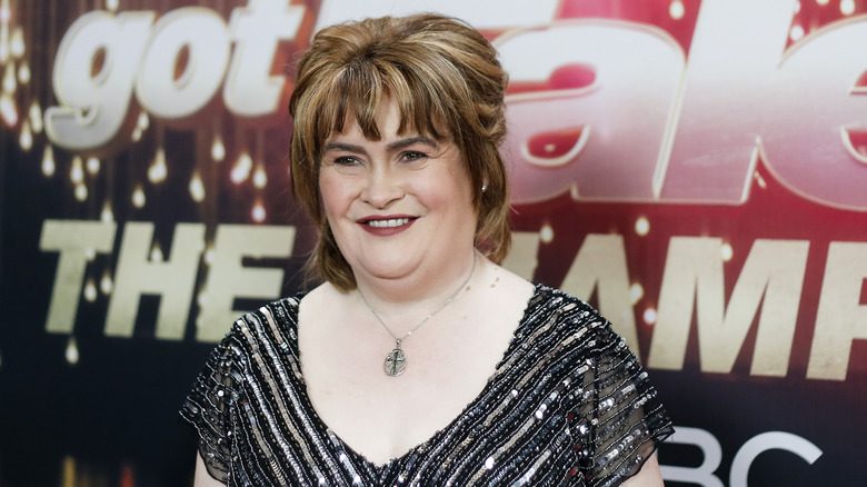 Susan Boyle smiling on the red carpet in 2018