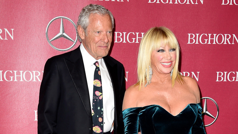 Alan Hamel and Suzanne Somers pose on red carpet