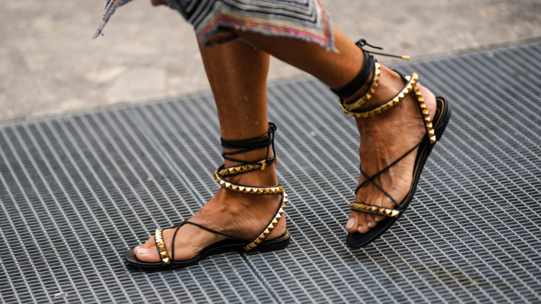 Closeup of studded sandals