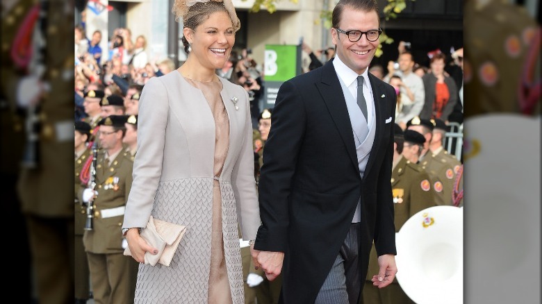 Princess Victoria and Prince Daniel holding hands