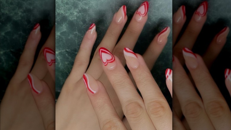 Red heart swirl nails