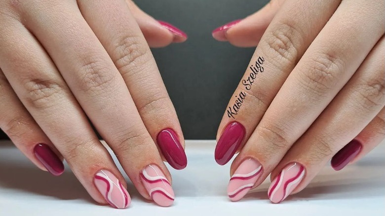 Fuchsia and light pink swirl nails