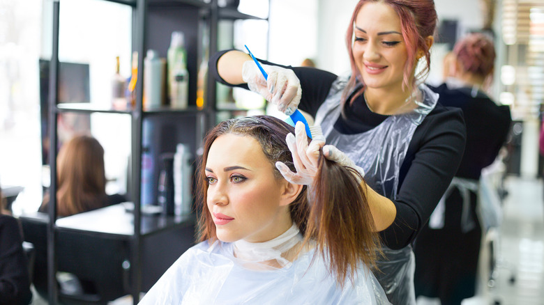 Woman getting her hair done at the salon