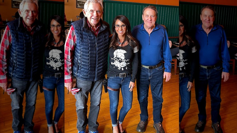 Lauren Boebert wearing Roman helmet shirt with 2 men