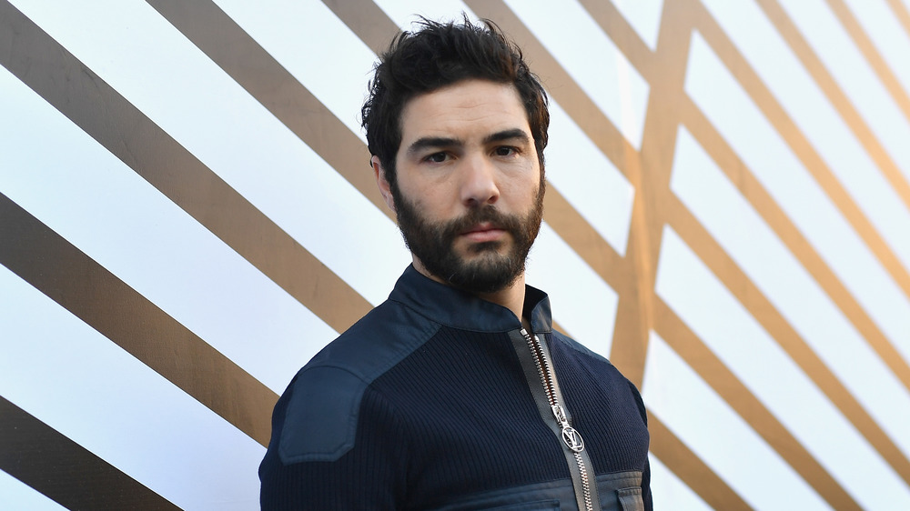 Actor Tahar Rahim posing