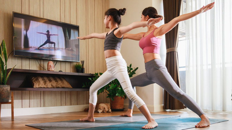 women doing yoga at home
