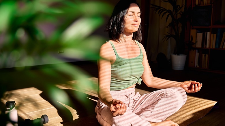 woman practicing meditation