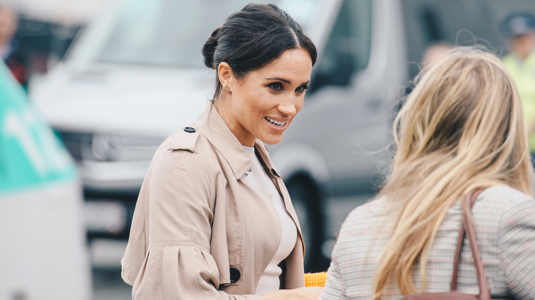 Meghan Markle smiles