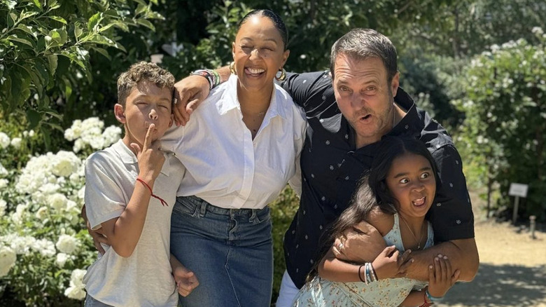 Tamera Mowry-Housley and Adam Housley with kids