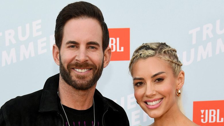 Tarek El Moussa and Heather Rae Young pose together