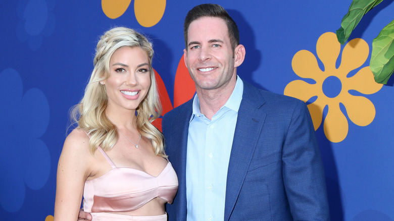 Heather Rae Young and Tarek El Moussa posing