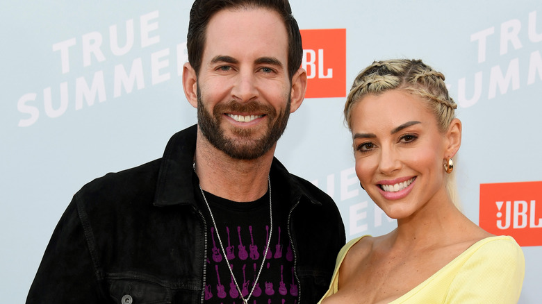 Tarek El Moussa and Heather Rae Young on red carpet