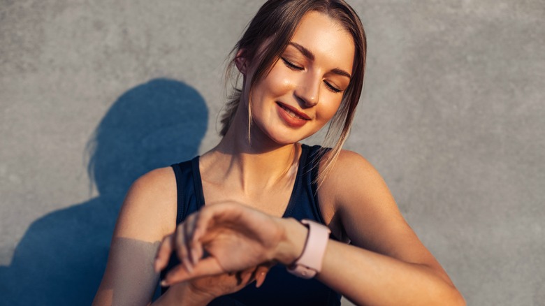 Woman looking at watch