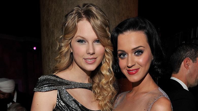 Katy Perry and Taylor Swift posing for photos