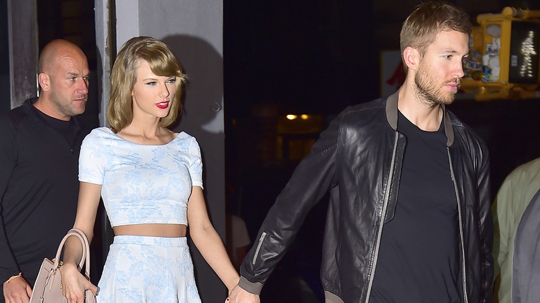 Calvin Harris and Taylor Swift walking