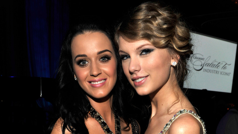 Taylor Swift and Katy Perry posing for photos