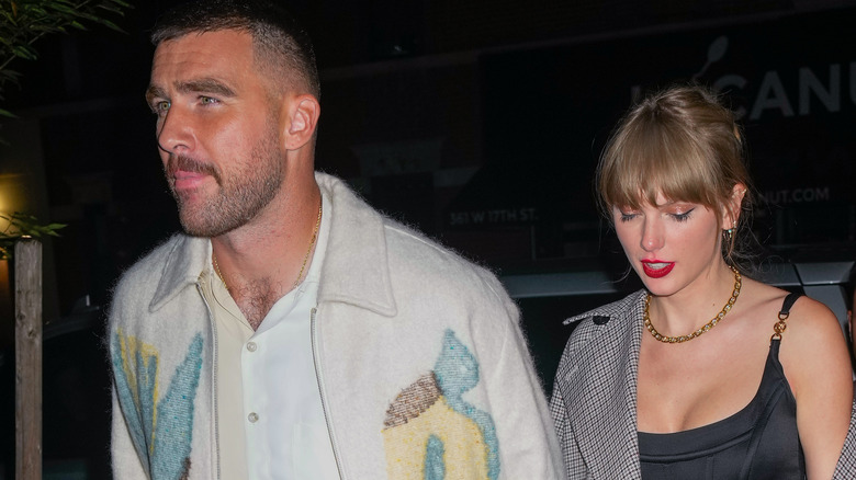 Travis Kelce and Taylor Swift walking together