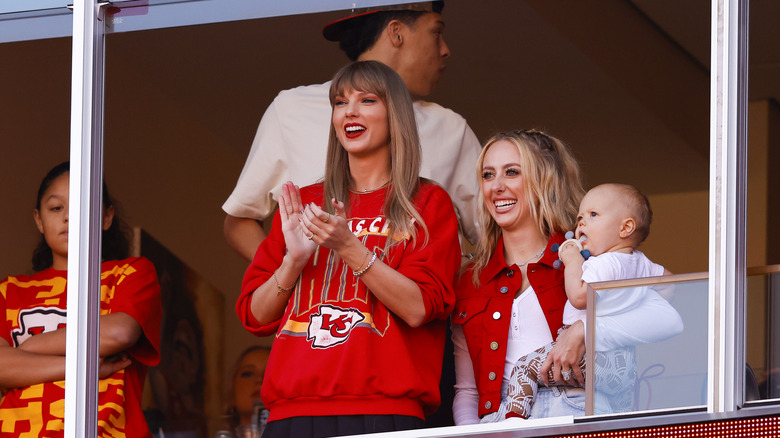 Taylor Swift in a red Kansas City Chiefs sweatshirt