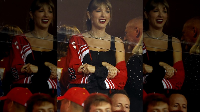 Taylor Swift in a red Chiefs jacket