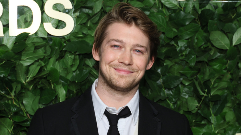 Joe Alwyn smiling in close-up