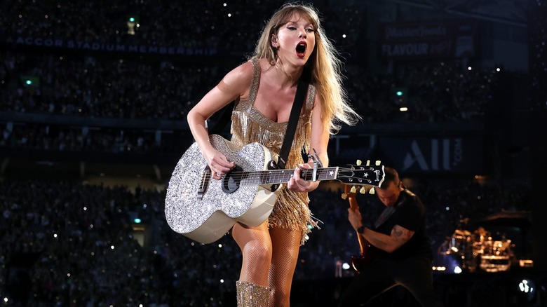 Taylor Swift playing guitar