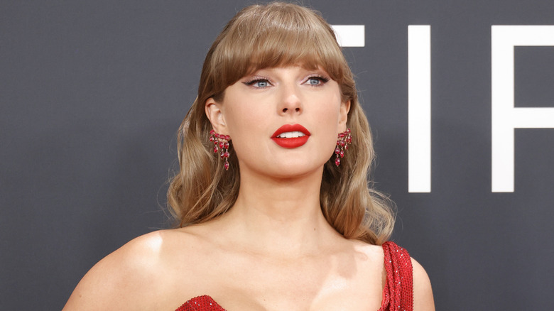 Taylor Swift wearing red at the 2025 Grammy Awards