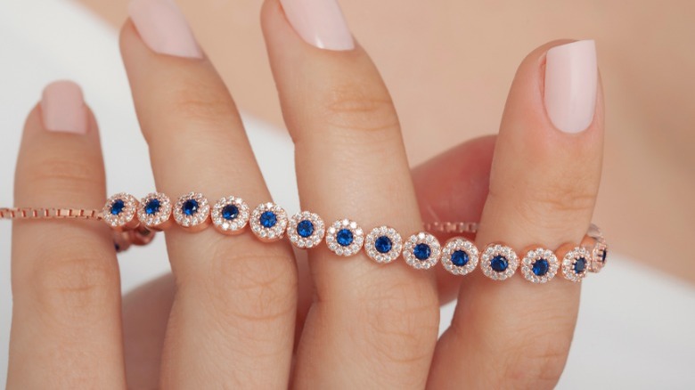 modern tennis bracelet with blue stones