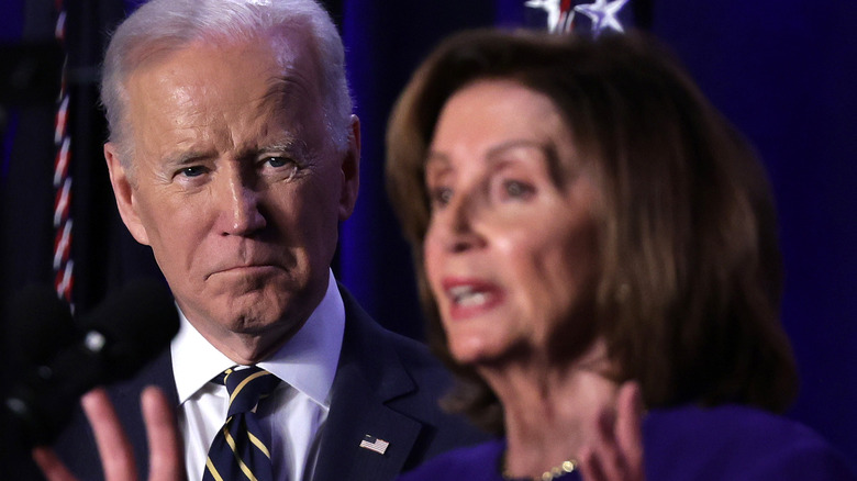 Joe Biden looking at Nancy Pelosi