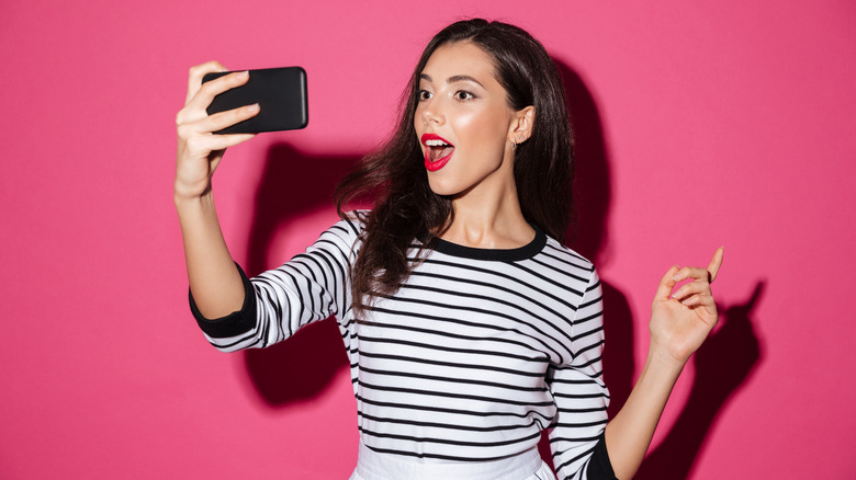 Woman taking selfie