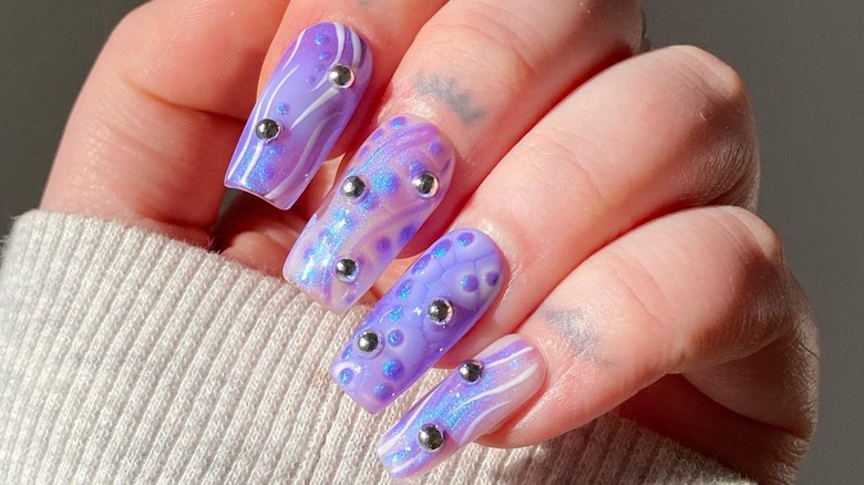 purple nail art with pearls, textured nails manicure