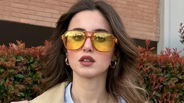 Woman wearing oversized aviators