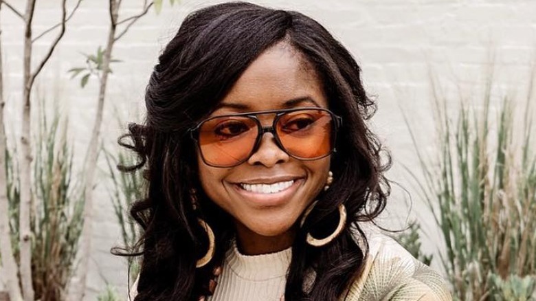 Woman wearing tinted sunglasses