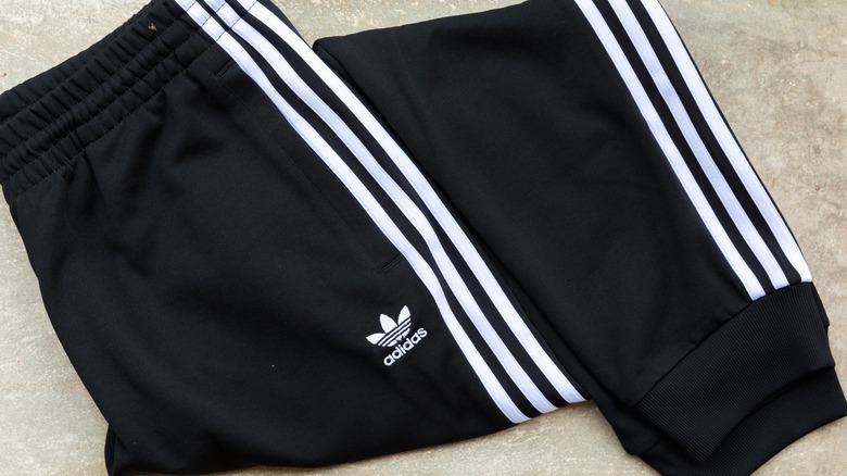 Black Adidas track pants