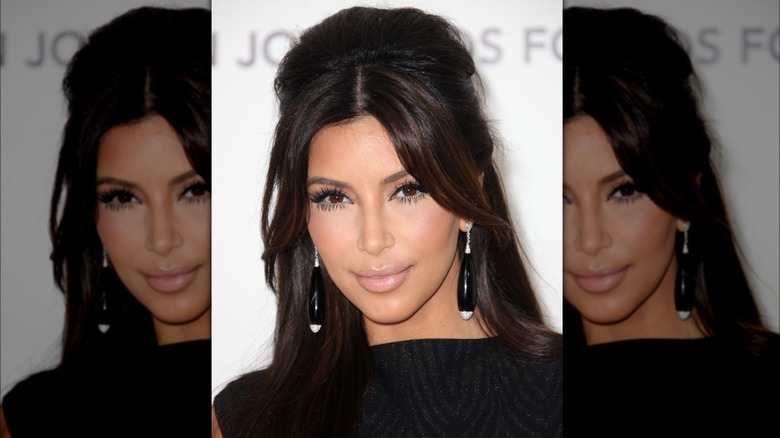 Kim Kardashian with half-up beehive