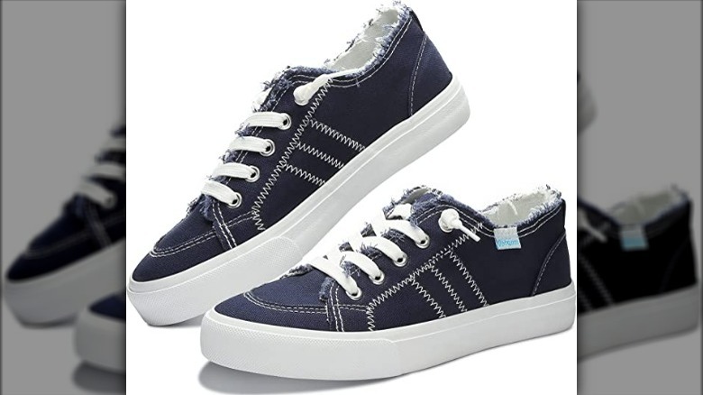 Blue low-top sneakers with raw edge design