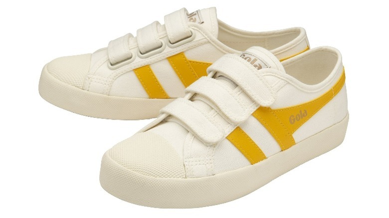 White and yellow sneakers with Velcro closures