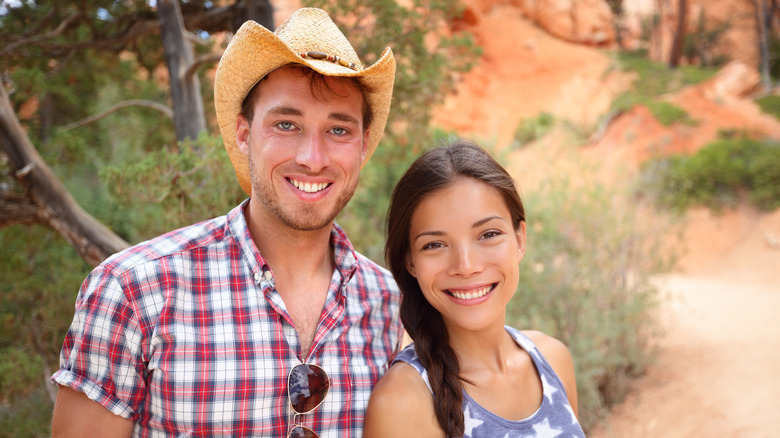 Smiling couple during a hike